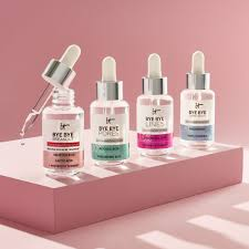 Serum bottle with dewy skin background